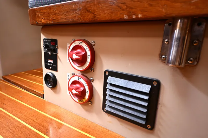 Slide: The Image of Control panel with switches and vent on 1989 C&C 37/40+ sailboat interior. - 30