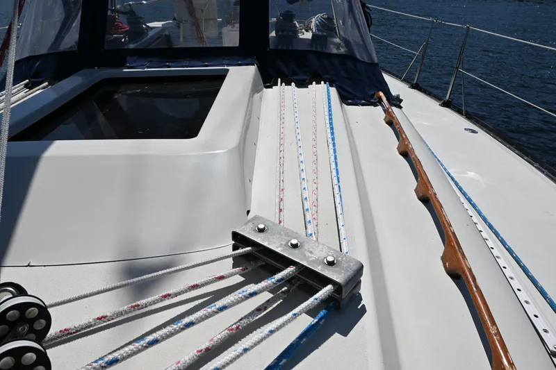 Slide: The Image of Deck of 1989 C&C 37/40+ sailboat with rigging and ropes. - 34