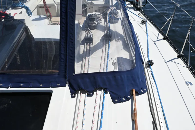 Slide: The Image of 1989 C&C 37/40+ sailboat deck with winches and ropes. - 36