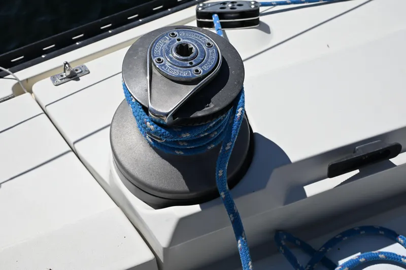 Slide: The Image of Winch with blue rope on 1989 C&C 37/40+ sailboat deck. - 37