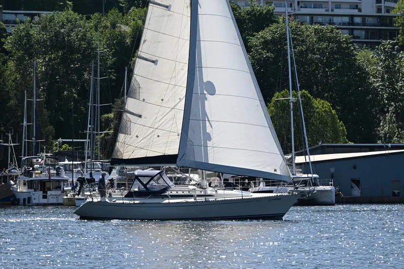 Slide: The Image of Sailboat C&C 37/40+ (1989) cruising on a sunny day near a marina. - 40