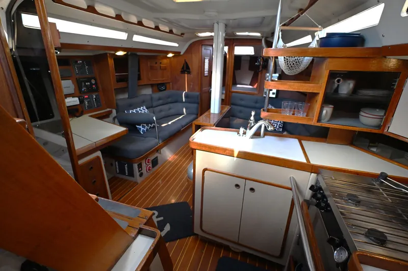 Slide: The Image of Interior of 1989 C&C 37/40+ sailboat with kitchen and seating area. - 7