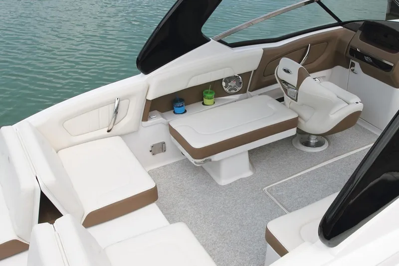 Slide: The Image of Manufacturer Provided Image: 2013 Chaparral 257 SSX boat interior with white and tan seating. - 16