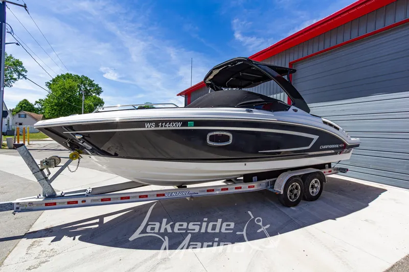 Slide: The Image of 2013 Chaparral 257 SSX boat on trailer at Lakeside Marina, sunny day. - 4