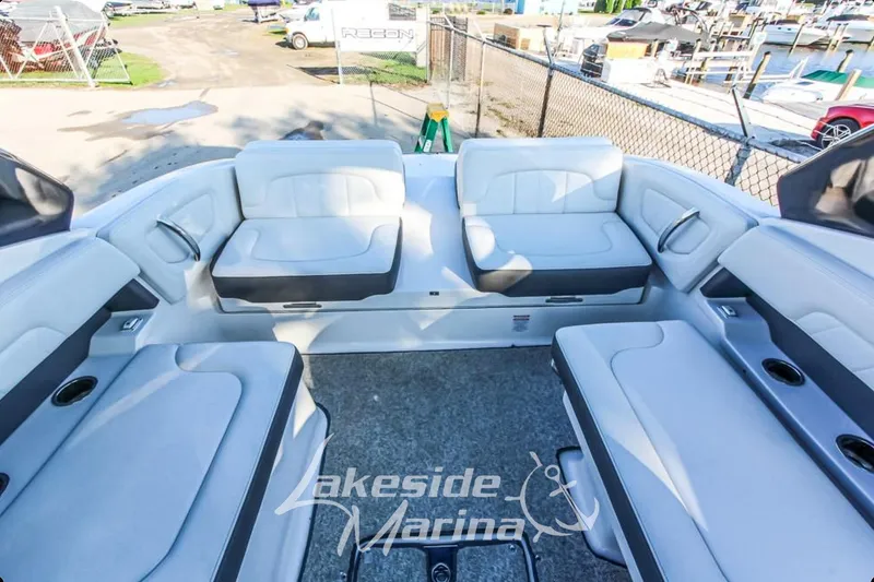 Slide: The Image of 2013 Chaparral 257 SSX boat interior with spacious seating at Lakeside Marina. - 6