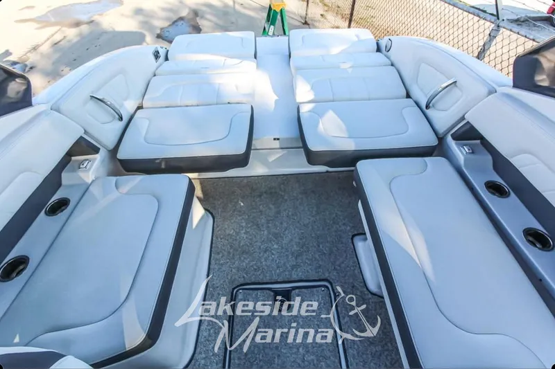 Slide: The Image of 2013 Chaparral 257 SSX boat interior with spacious seating at Lakeside Marina. - 7