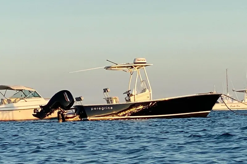 The Image of Boat on water, Gloucester G-20, 2004 model, with outboard motor, under clear sky. - 0