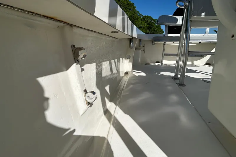 Slide: The Image of Interior view of a 2004 Gloucester G-20 boat, showcasing seating and fixtures. - 14