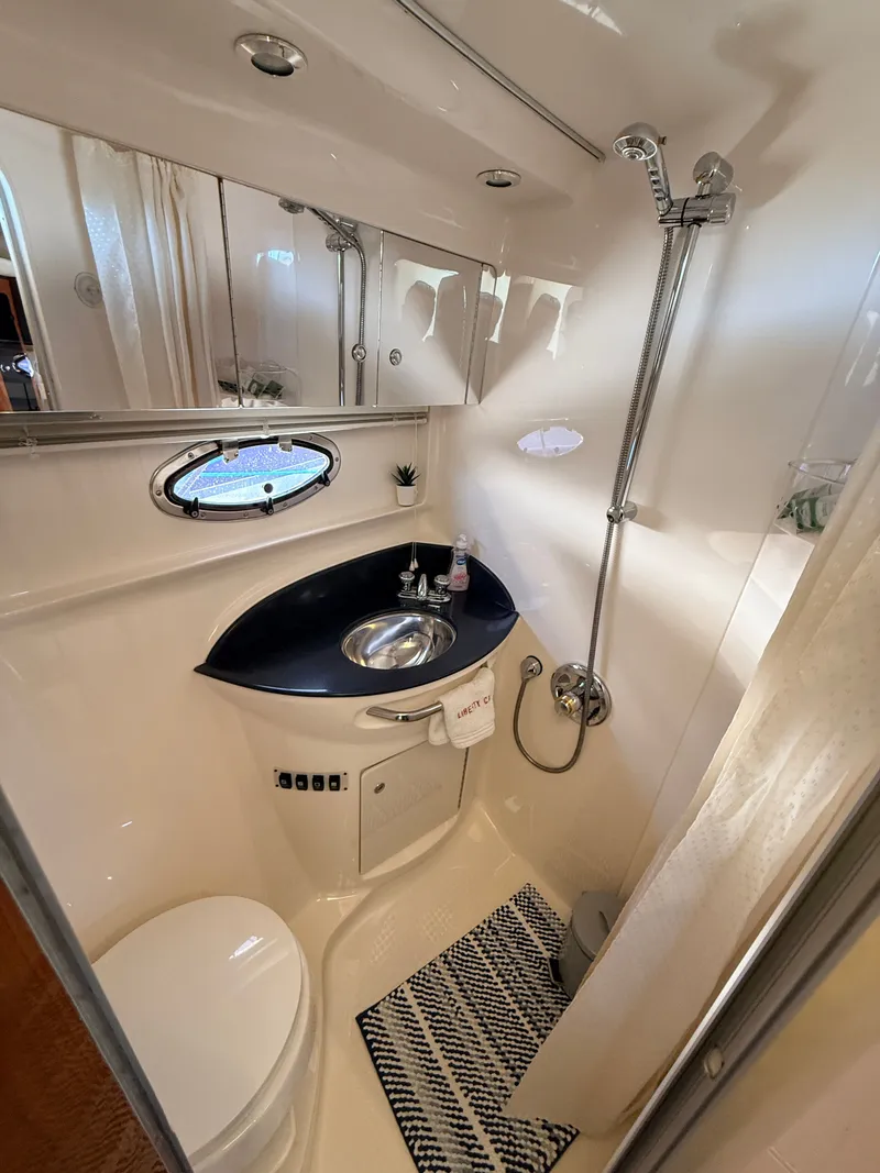 Slide: The Image of Bathroom in 2001 Chaparral 350 Signature boat. - 15