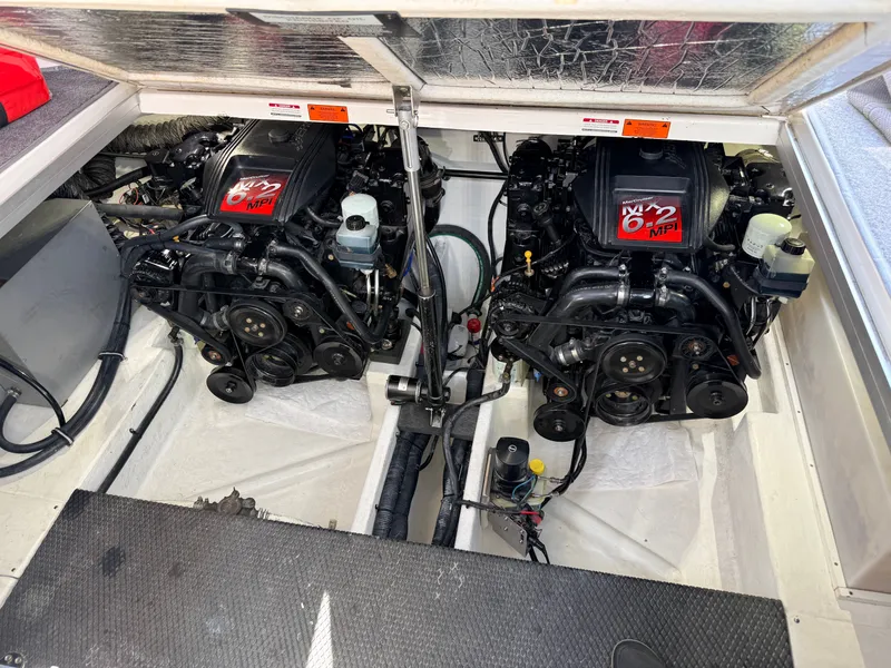 Slide: The Image of Engine compartment of a 2001 Chaparral 350 Signature boat. - 16