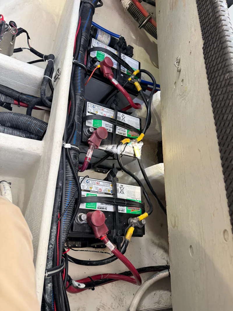 Slide: The Image of Batteries in the engine compartment of a 2001 Chaparral 350 Signature boat. - 22