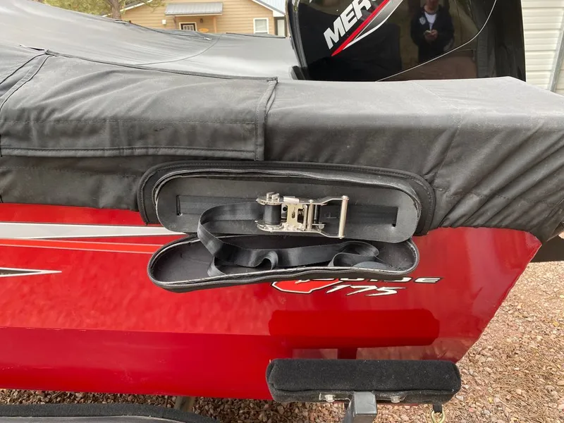 Slide: The Image of 2021 Tracker Pro Guide boat with cover and motor. - 7