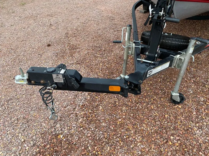 Slide: The Image of Tracker Pro Guide 2021 trailer hitch on gravel surface. - 8