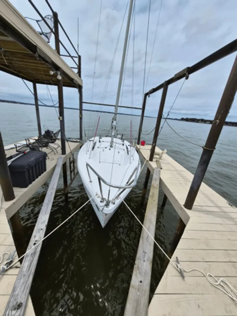 Slide: The Image of 2006 Catalina 22 Sport sailboat moored at dock. - 1