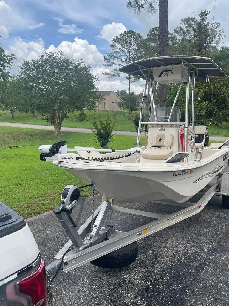 The Image of 2015 Carolina Skiff 198 DLV on trailer parked outdoors. - 0