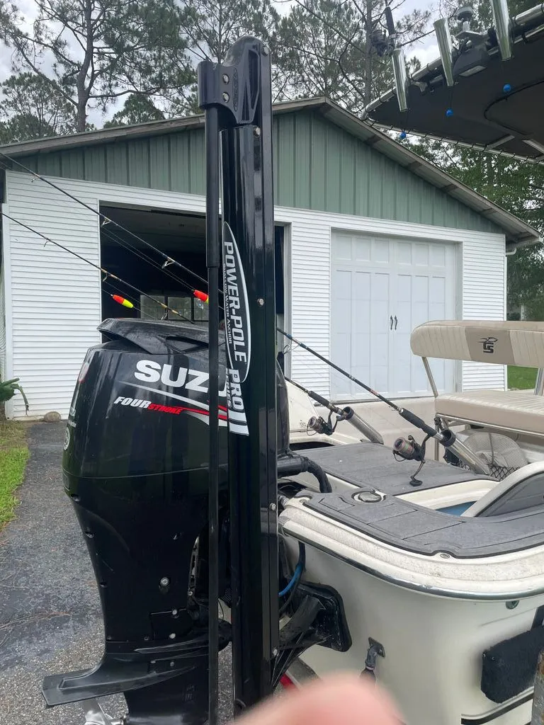 Slide: The Image of 2015 Carolina Skiff 198 DLV with Suzuki outboard motor. - 11