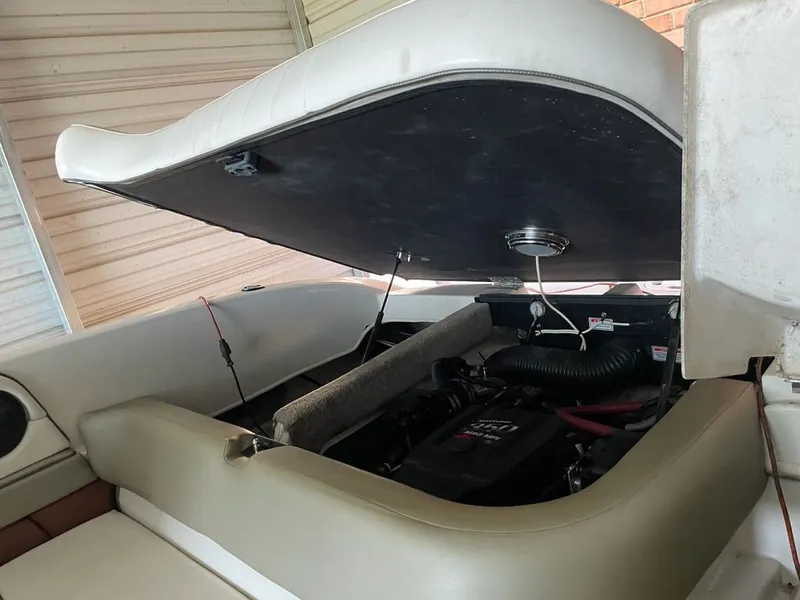 Slide: The Image of Engine compartment of a 2006 Sea Ray 220 Select boat. - 10