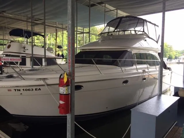 Slide: The Image of 2003 Meridian 411 Sedan yacht docked in marina. - 3