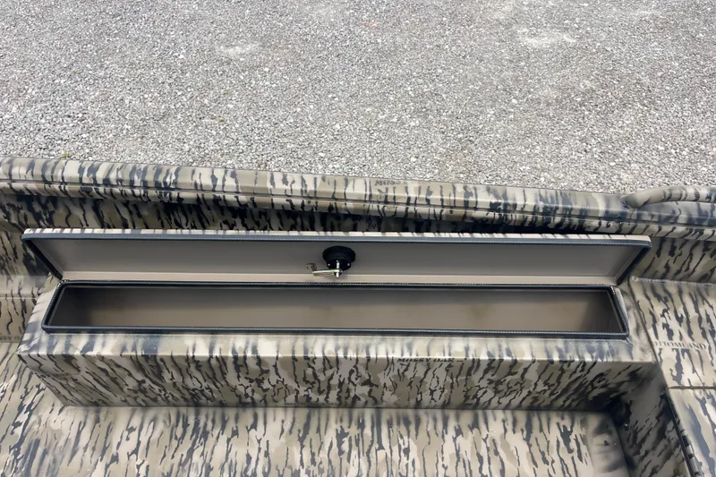 Slide: The Image of Camouflage-patterned storage compartment in 2026 Excel 1854 F4 Pro boat. - 11