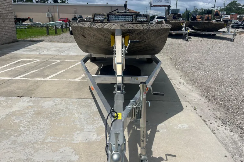 Slide: The Image of Front view of 2026 Excel 1854 F4 Pro boat on trailer in parking lot. - 7