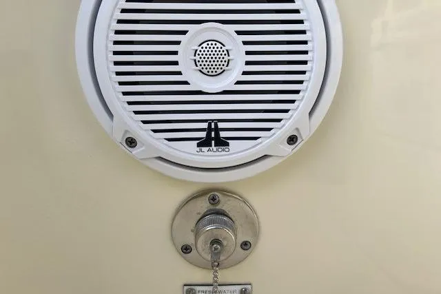 Slide: The Image of JL Audio speaker and freshwater inlet on 2015 Chris-Craft Catalina 23 boat. - 10
