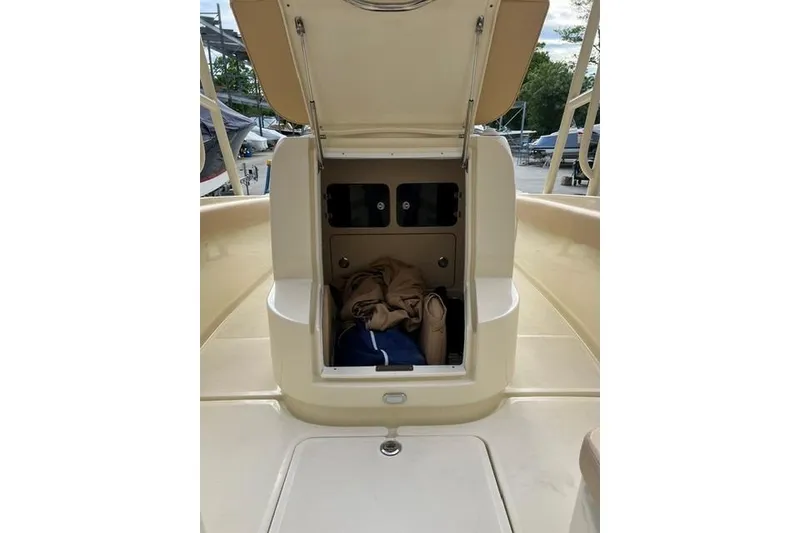 Slide: The Image of 2015 Chris-Craft Catalina 23 boat storage compartment open, revealing interior space. - 25