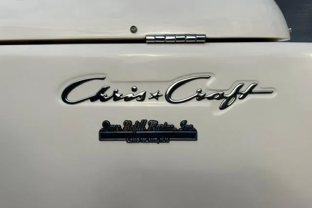 Slide: The Image of Chris-Craft Catalina 23 boat emblem, 2015 model, featuring classic logo design. - 7