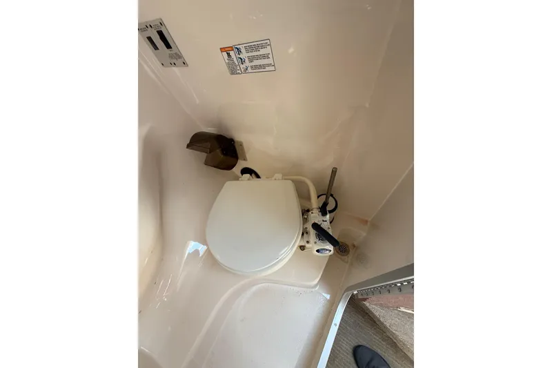 Slide: The Image of Boat bathroom with toilet in 2000 Chaparral Signature 240. - 41