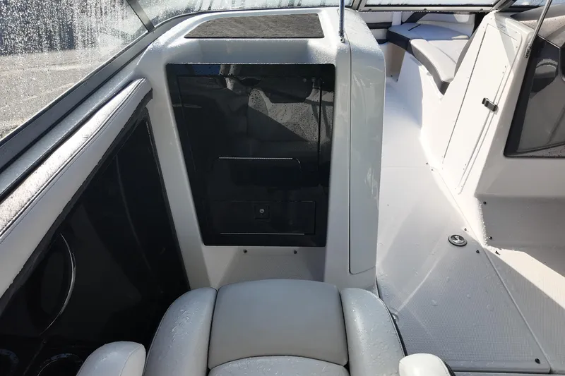 Slide: The Image of Interior view of 2017 Yamaha Boats 242 Limited S E-Series, showcasing seating and console. - 11