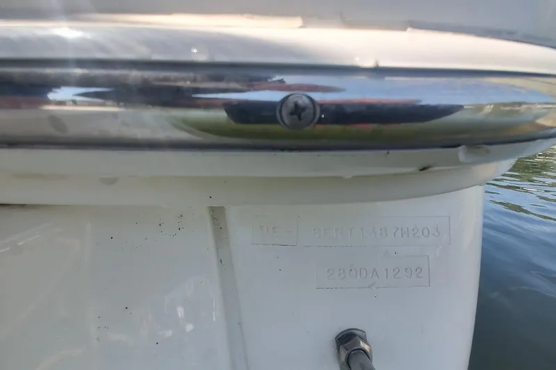 Slide: The Image of Close-up of a 2003 Sea Ray Sundancer 280 boat hull identification number. - 18