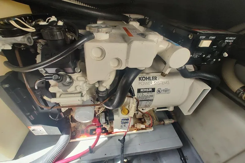 Slide: The Image of Engine compartment of a 2003 Sea Ray Sundancer 280 with Kohler power system. - 30
