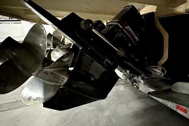 Slide: The Image of Propeller and outdrive of a 2003 Sea Ray Sundancer 280 boat in a garage. - 46