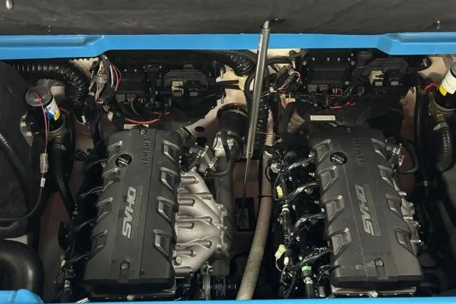 Slide: The Image of 2023 Yamaha Boats 255XE engine compartment showcasing dual SVHO engines. - 16