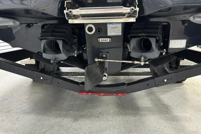 Slide: The Image of Rear view of 2023 Yamaha Boats 255XE showing dual jet propulsion system. - 33