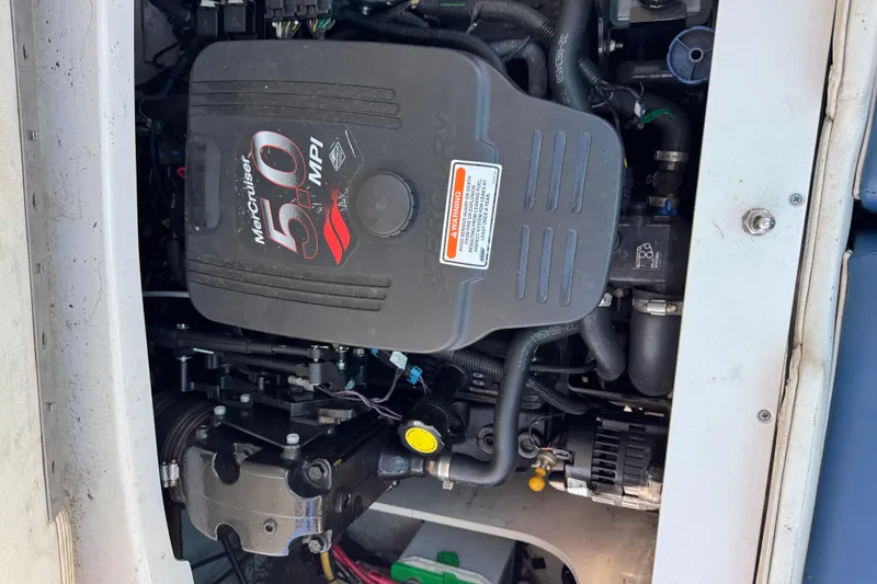 Slide: The Image of Engine compartment of a 2006 Crownline 21 Classic with MerCruiser 5.0 MPI engine. - 3