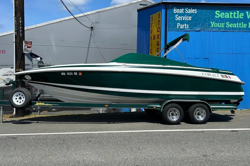 The Image of 1995 Cobalt 253 boat on trailer outside Seattle marine service shop. - 0