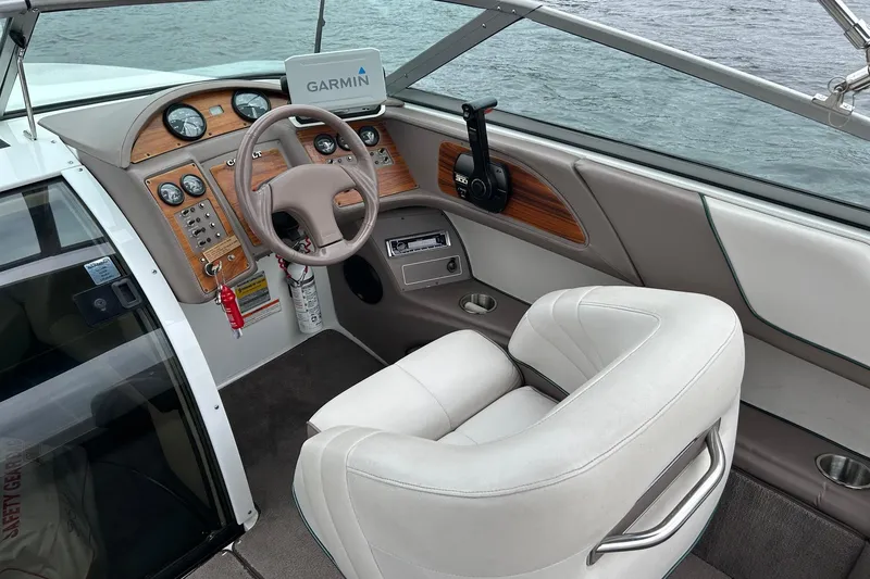 Slide: The Image of Interior of a 1995 Cobalt 253 boat with Garmin navigation system. - 11