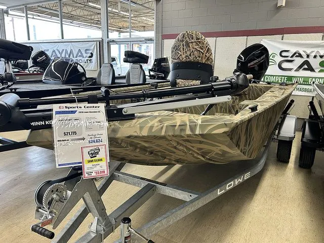 Slide: The Image of 2026 Lowe Skorpion SS boat on display in showroom. - 3