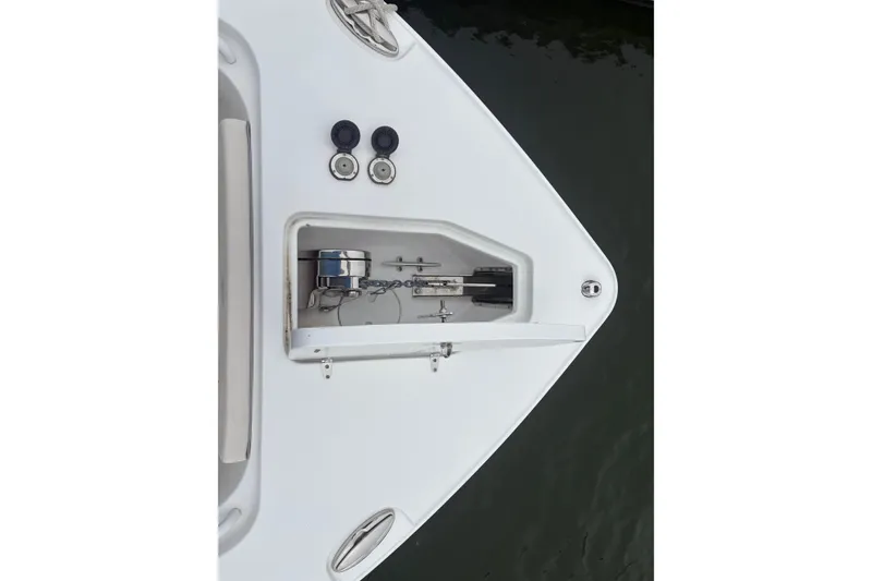 Slide: The Image of Bow view of 2025 Sea Hunt Gamefish 25, featuring anchor storage and fittings. - 21