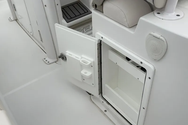 Slide: The Image of Open storage compartment on 2025 Sea Hunt Gamefish 25 boat interior. - 45