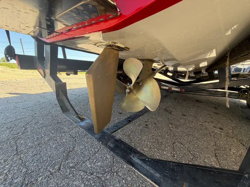 Slide: The Image of Underside of MB SPORTS B52 23 boat, propeller visible. - 10