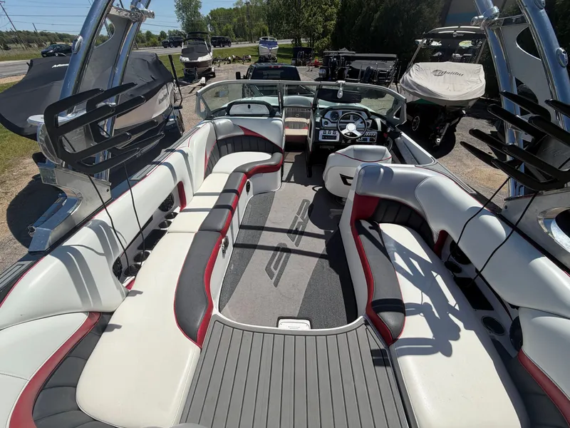Slide: The Image of Interior of a 2015 MB SPORTS B52 23 boat with luxurious seating. - 12