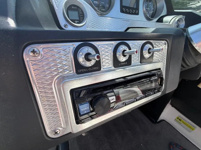 Slide: The Image of Dashboard of a 2015 MB SPORTS B52 23 with controls. - 16
