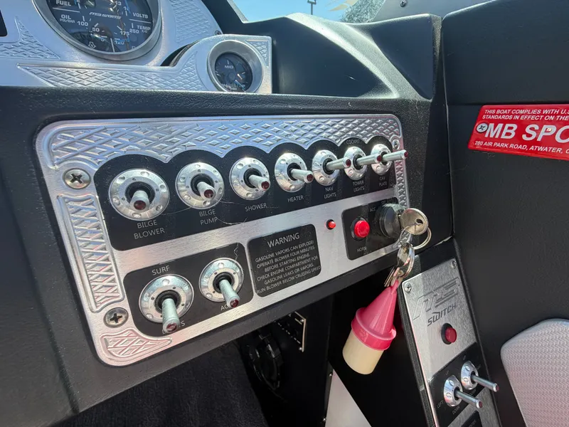 Slide: The Image of Dashboard of a 2015 MB SPORTS B52 23 boat. - 17