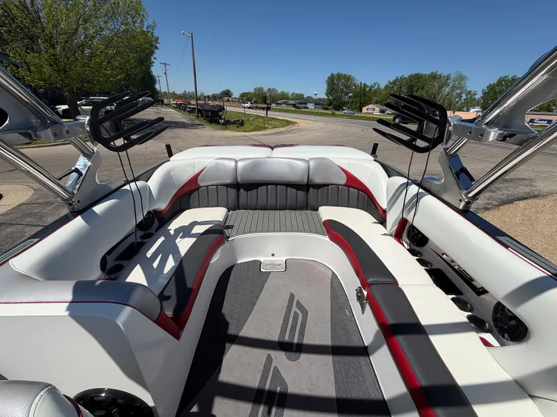 Slide: The Image of Interior of a 2015 MB SPORTS B52 23 boat with gray and red seating. - 20