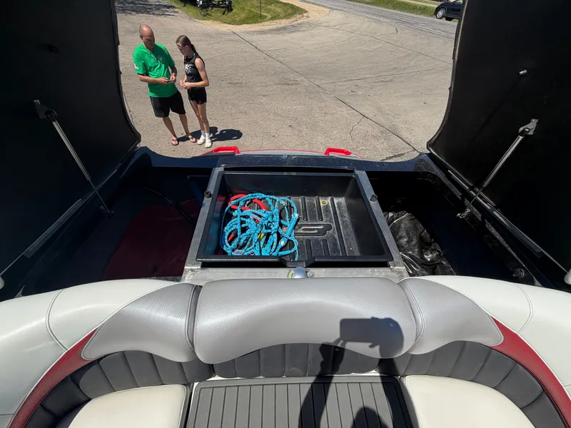 Slide: The Image of Interior of a 2015 MB SPORTS B52 23 boat with ropes in storage. - 35