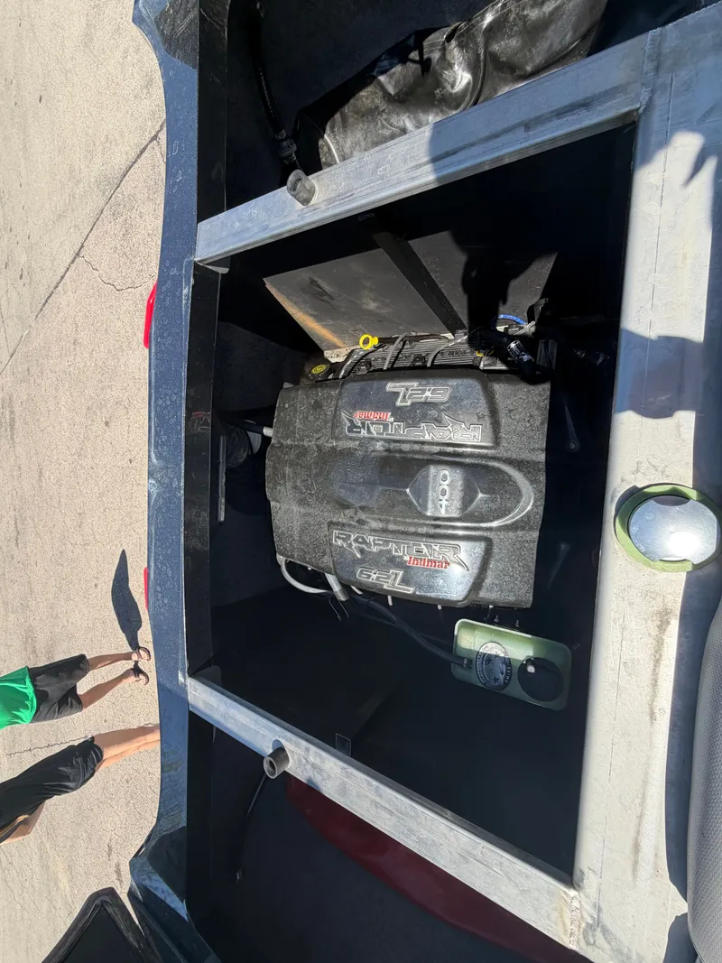 Slide: The Image of Engine compartment of a 2015 MB SPORTS B52 23 boat. - 38