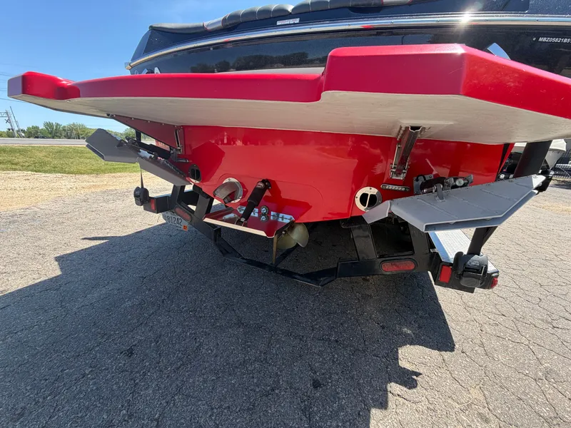 Slide: The Image of Red rear of a 2015 MB SPORTS B52 23 boat. - 9