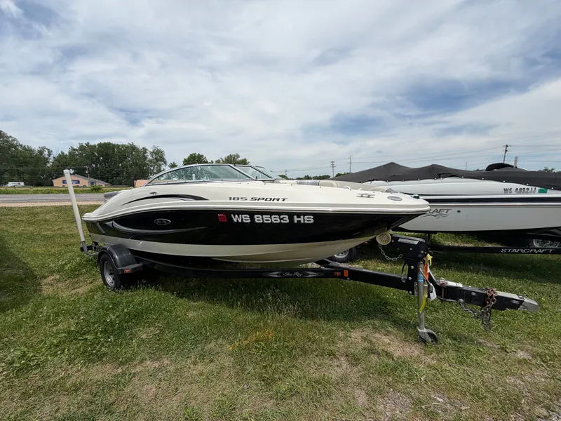Slide: The Image of 2010 Sea Ray 185 SP/SS boat on trailer, side view. - 11