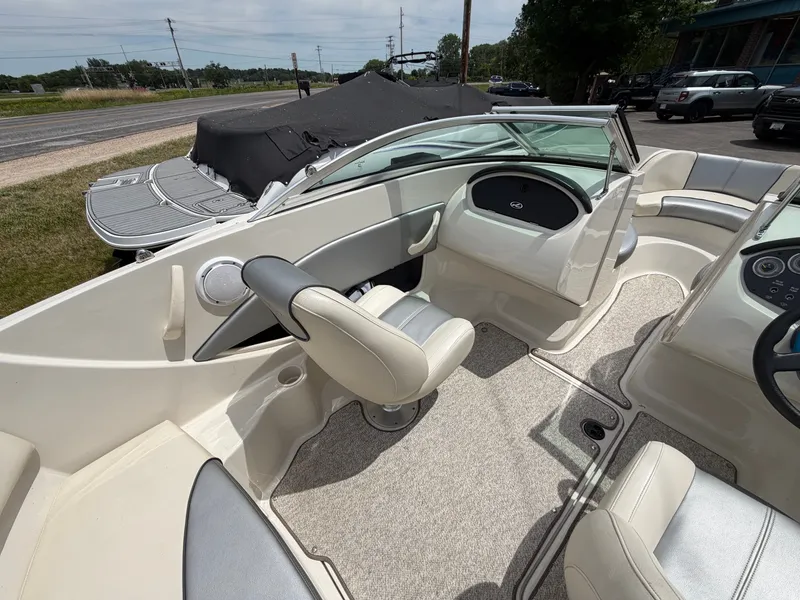 Slide: The Image of Interior of a 2010 Sea Ray 185 SP/SS boat with seating. - 22